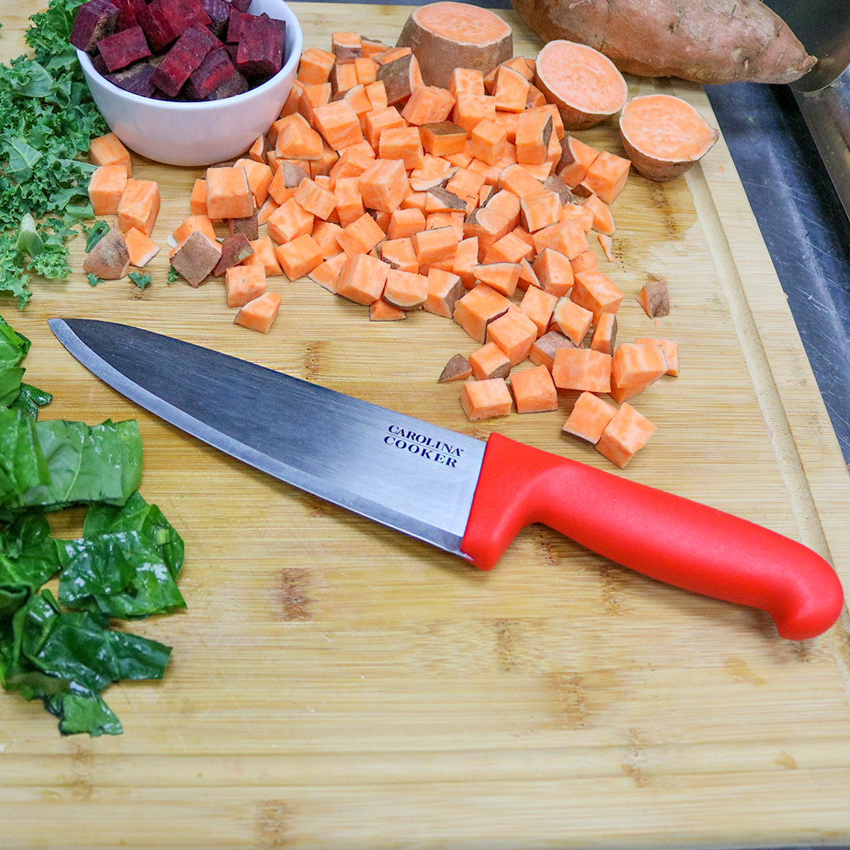 7" CHEF'S KNIFE W/ RED HNDL