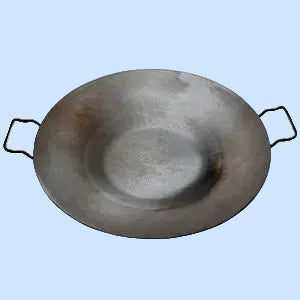 Large metal pan with handles on a white background